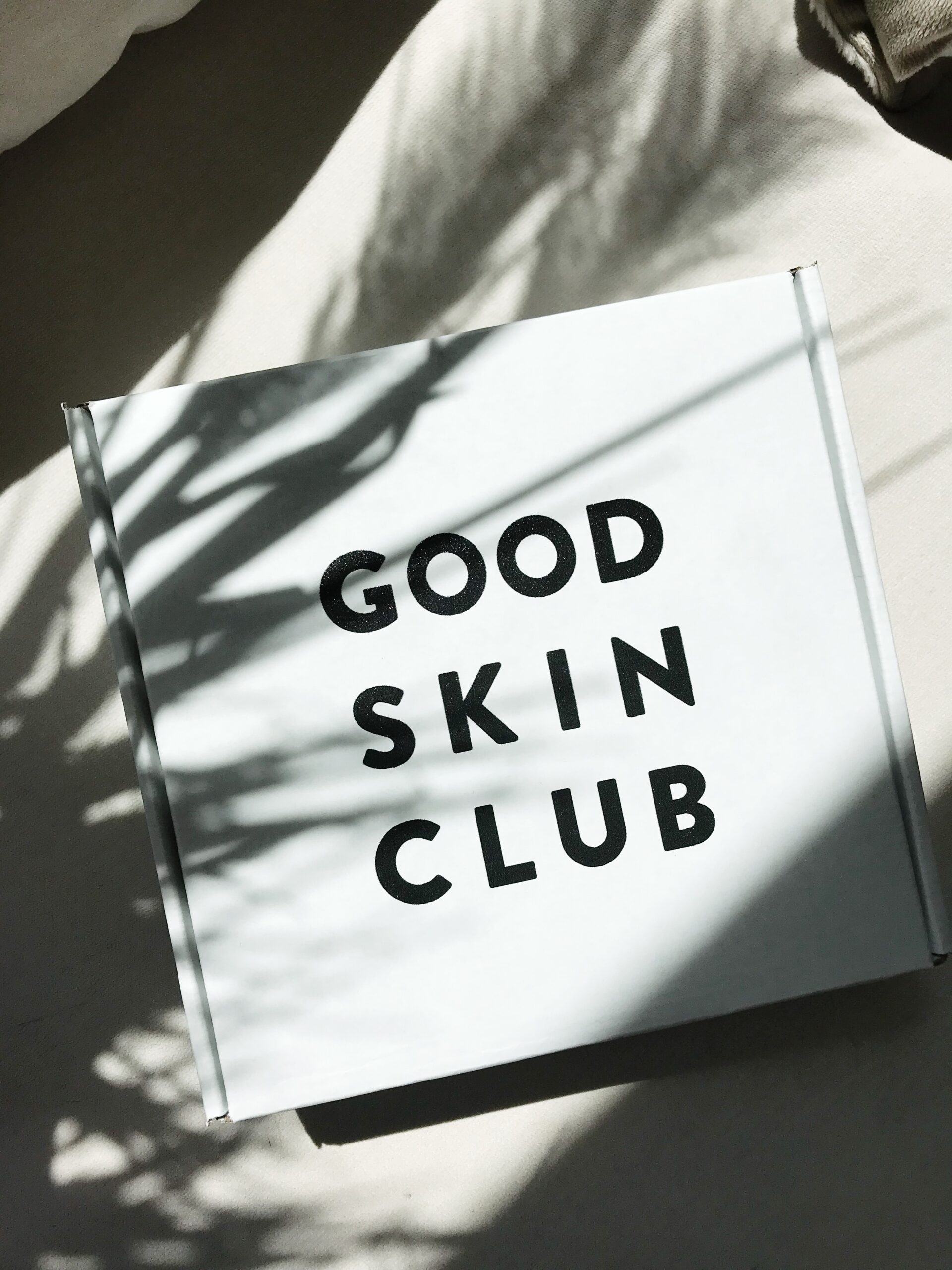 Page on ground that says Good Skin Club